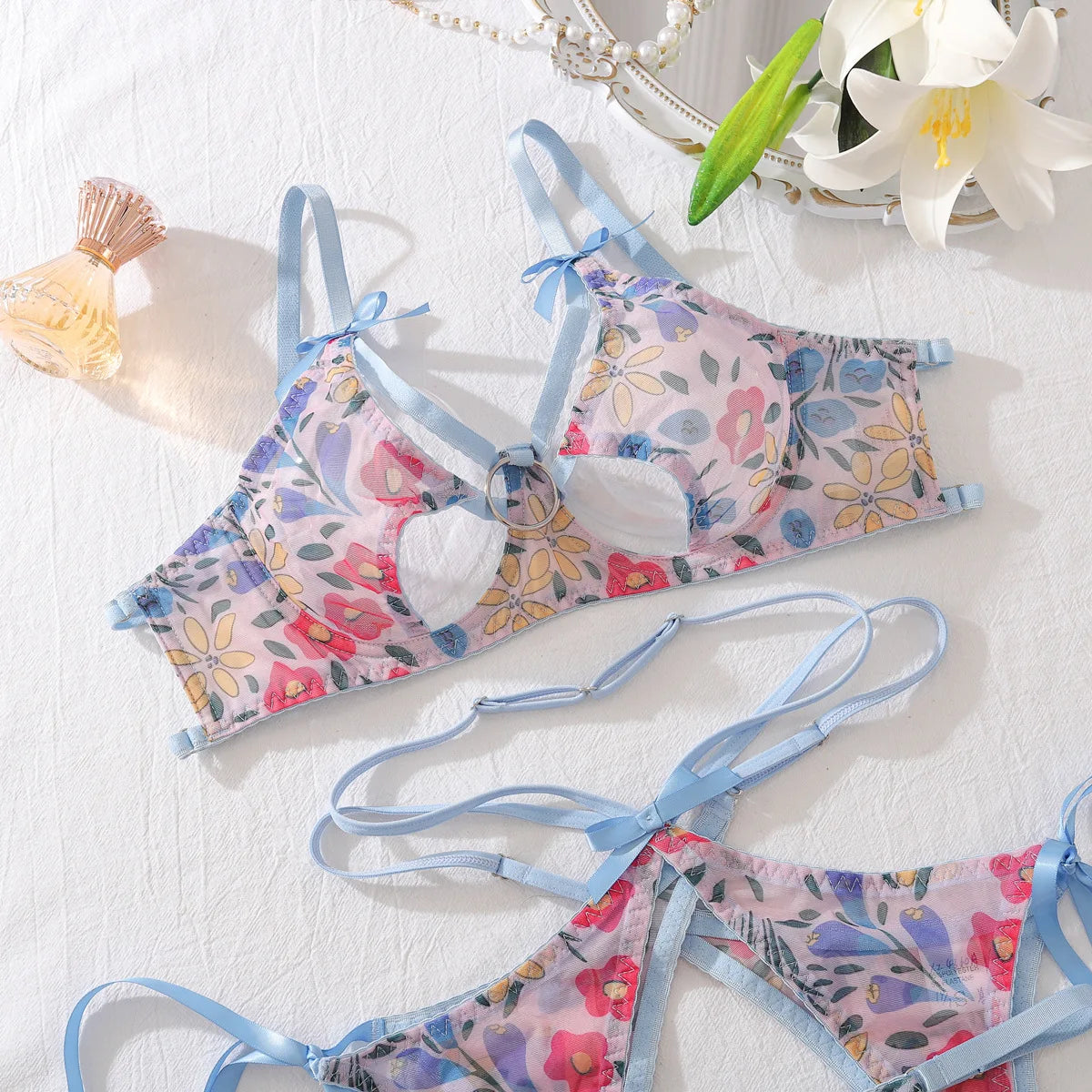 DEROSSI ブルー フローラルプリント シアー ガーターブラショーツSET